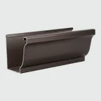 A K-style gutter, seen from the end. The front face curves in an ogee.